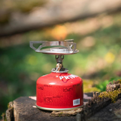 Best Backcountry Canister Stove: stove pictured outdoors - Gear Hacker